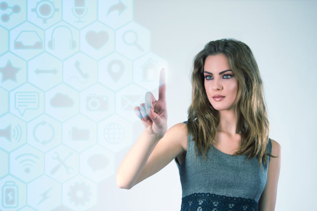 Businesswoman working with modern virtual technologies hands touching the screen.