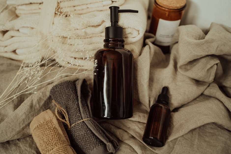 Products in a beautiful, modern, and non-clinical bathroom setting, emphasizing cleanliness and well-being - Social Media Agency for Feminine healthcare bottle on towels