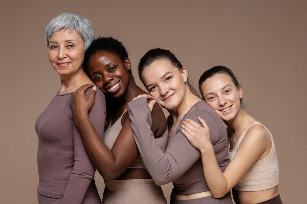 women's holding each other
