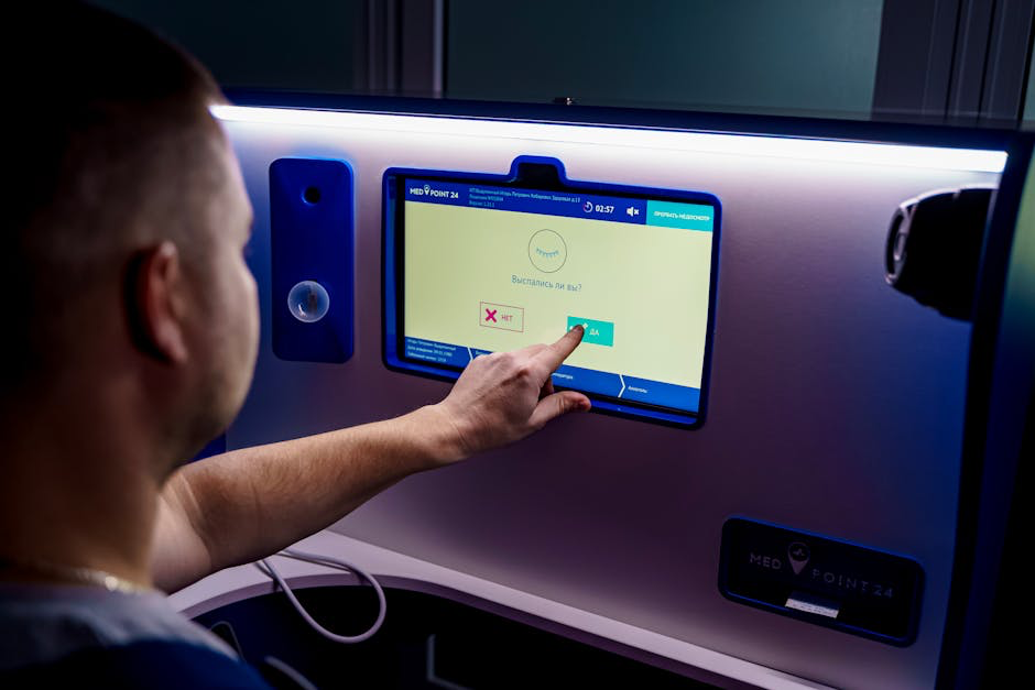 Person using a touchscreen medical kiosk with options displayed in Russian
