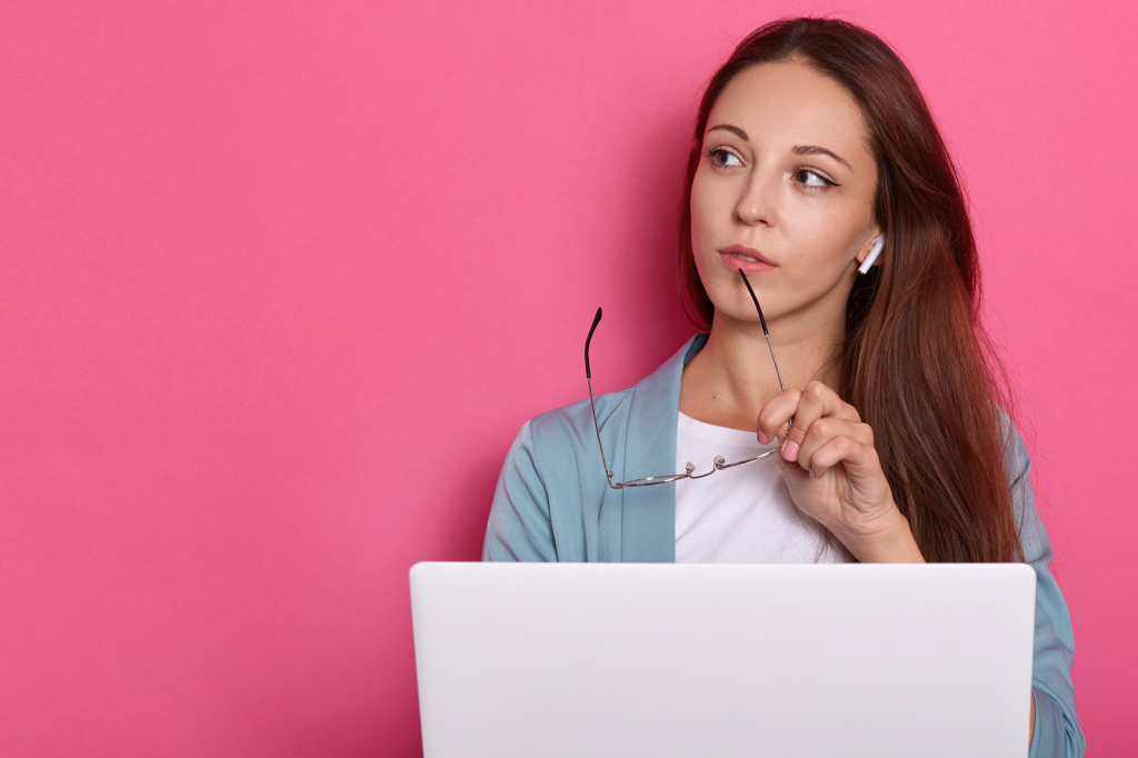 Pink background and women thinking 