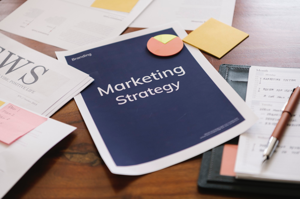 Desk with papers and marketing strategy 