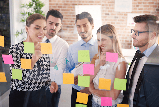 sticky notes on a transparent board 