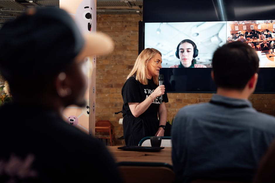 Speaker presenting to an audience.