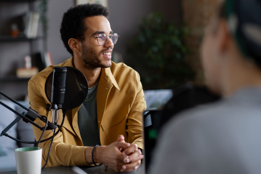 Podcast recording with two speakers.