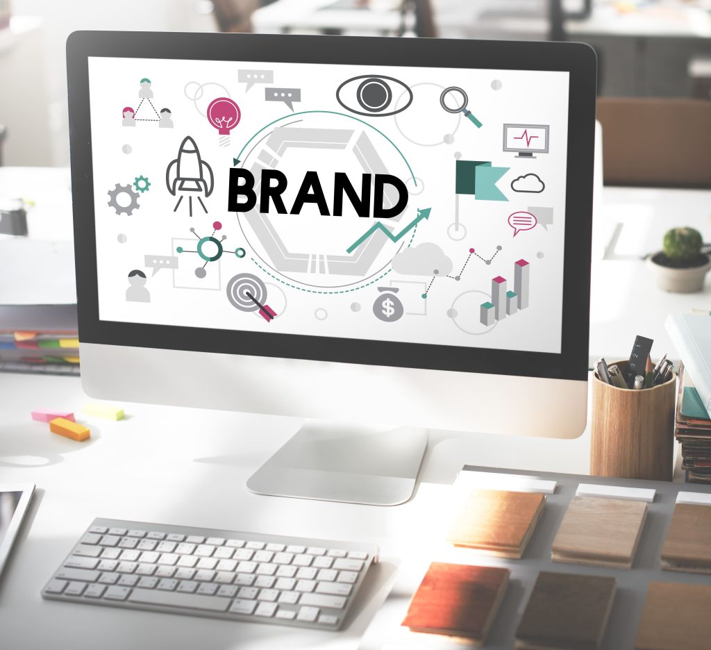 brand on computer and icons