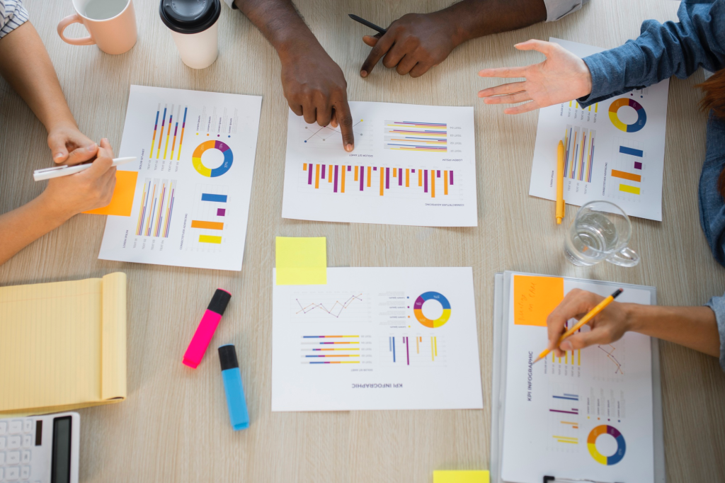 People working with infographic