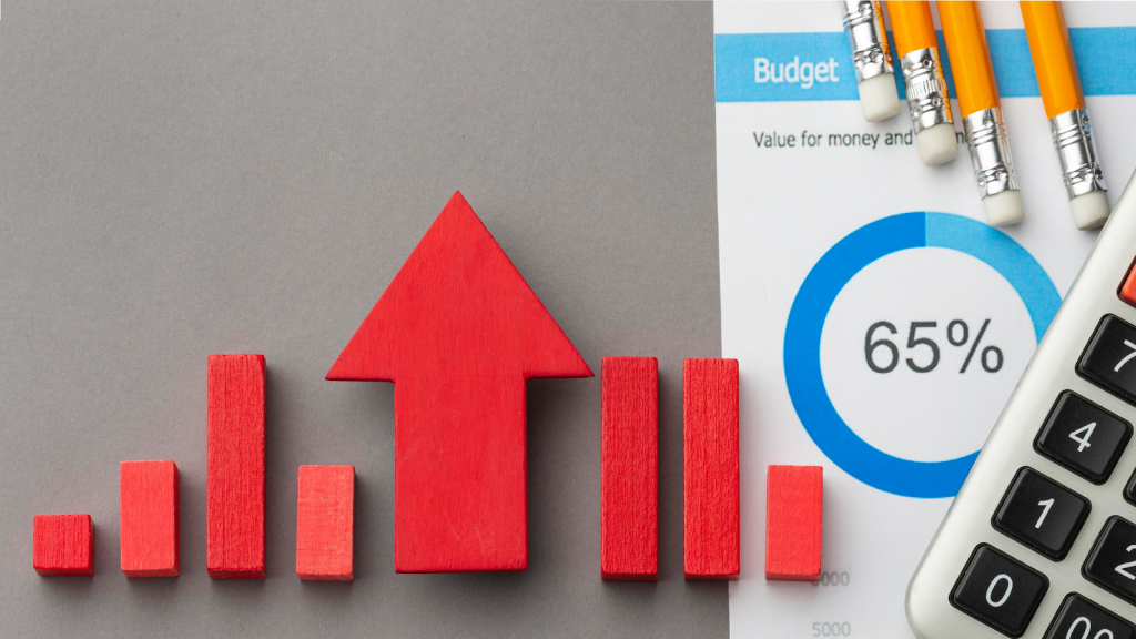 Red growth chart with budget document