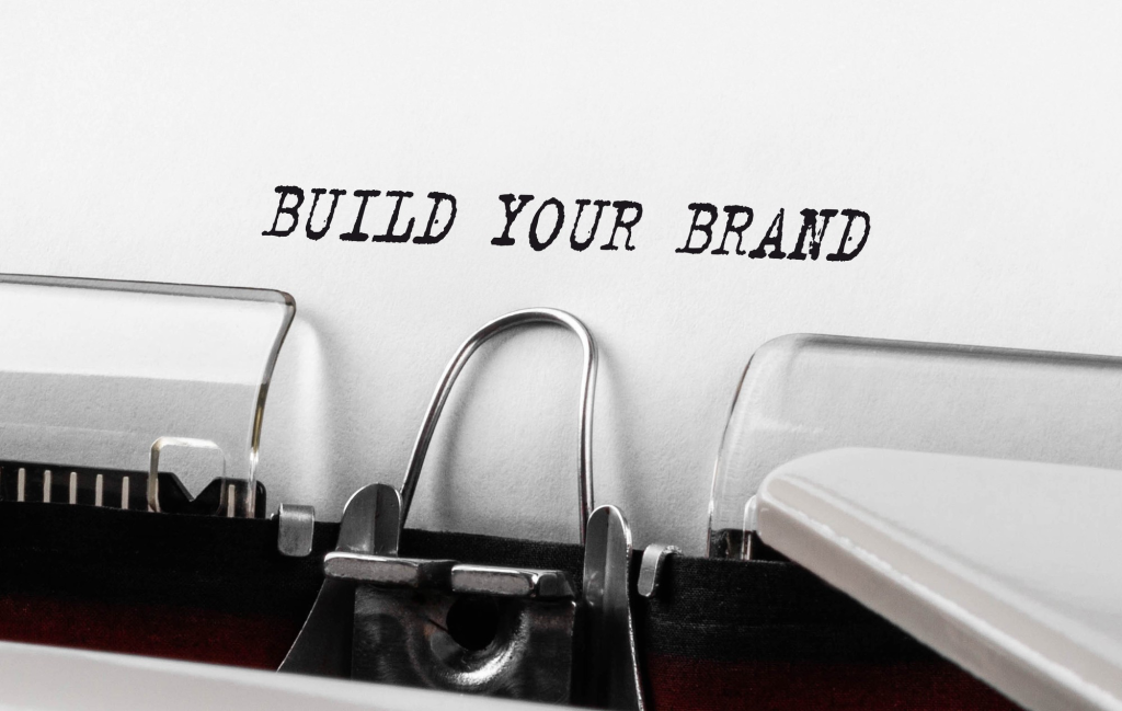 build your brand typed with a writer machine