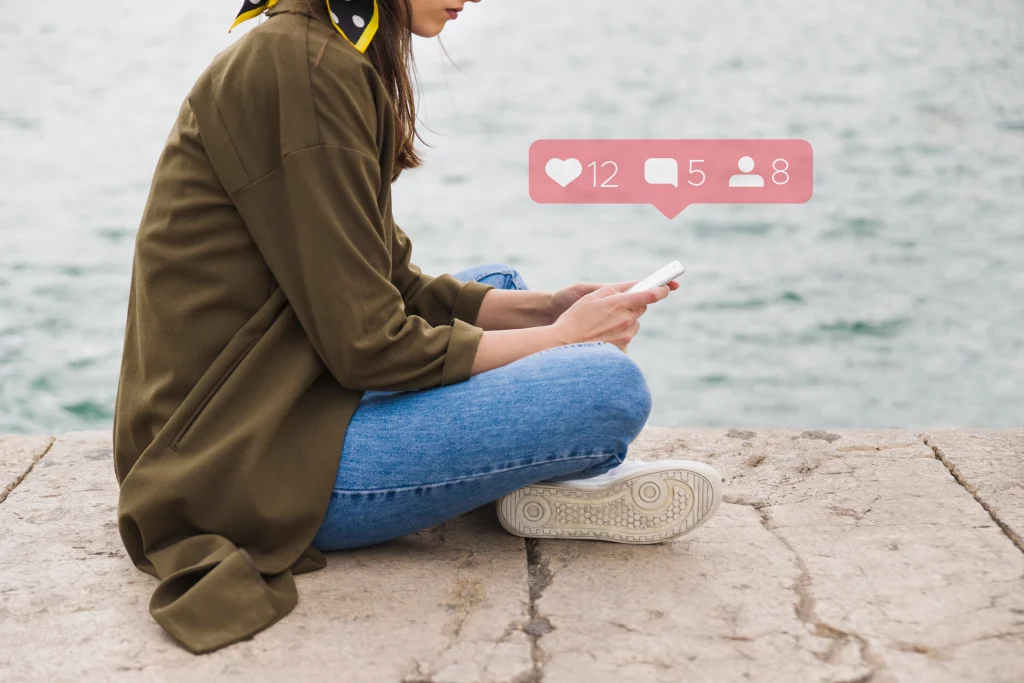 someone sitting with likes, comment