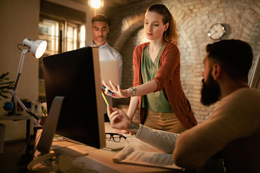 People in a office talking