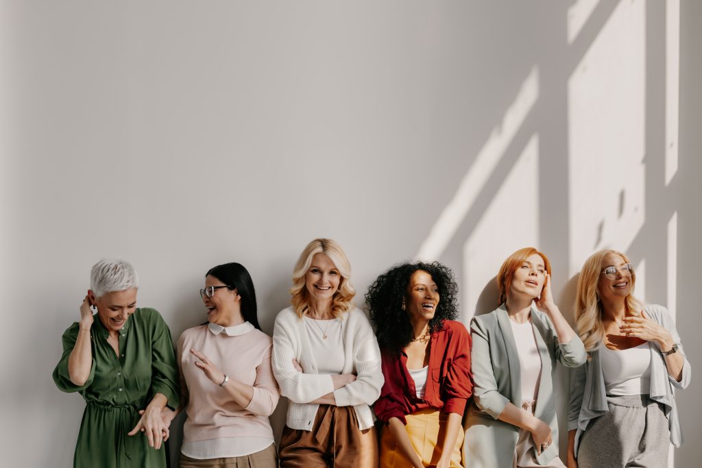 six woman laughing